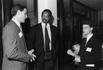 [1992-11-16] Jesse Jackson with two students at Florida International University